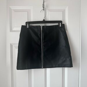 Black high-waist faux leather miniskirt with silver zipper detail - NEVER WORN!